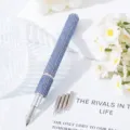 Close-up detail of blue rhinestone nail art pen showing 5 interchangeable functional metal tips - Blue
