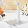 Detail van witte nagellampstandaard met fonkelende strass-basis en draaibare kop - Wit AB