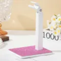 Detail van een 360 graden draaibare witte nagellampstandaard met roze strass-steentjes basis - Roze