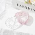 Detailed view of heart-shaped crystal nail art cup with pink pearls and rhinestones - Heart-Shaped With Lid Pink Artificial Pearl Style / Pink Pearl And White