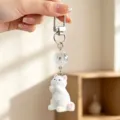 Hand-held adorable white flocked cat keychain featuring a clear faceted crystal bead - Gate Buckle (Style 1)