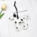 Ciondolo per borsa in pelle a forma di dalmata su sfondo di rivista - Bianco