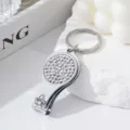 Rhinestone studded 2-in-1 nail clipper and bottle opener keychain in silver finish - White