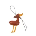 Detailed close-up of a creative brown leather duck bag charm with stylish yellow accents - Dark Coffee