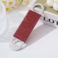 Flat stainless steel beer bottle opener with red rhinestone inlay decoration. - Red