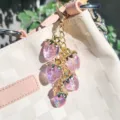 Purple resin strawberry fruit keychain with gold heart clasp for bag charm decoration - Transparent Purple