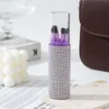 Detail view of a 5-piece travel makeup brush set with a luxury rhinestone case. - AB White