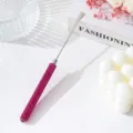Close-up of pink rhinestone handle on stainless steel nail art mixing spatula tool - Rose Red