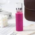Close-up of pink rhinestone makeup brush set with 5 soft brushes in clear case - Rose Red
