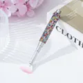 Detail view of nail art fan brush featuring a colorful rhinestone-encrusted handle - Colorful Zirconia