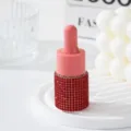 Portable pink dropper bottle decorated with vibrant red rhinestones for travel and perfume. - 10ml / Red