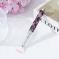 Detailed view of nail art fan brush featuring sparkling purple and black rhinestones - Pink Leopard