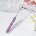 Close-up of rhinestone nail mixing spatula with purple handle on white background. - Light Purple