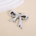 Silver metallic bow-shaped DIY pendant with smooth polished finish for jewelry - 4.7x4cm