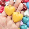 Vibrant bright yellow acrylic heart-shaped charms with hanging holes for DIY jewelry making - Yellow