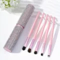 Detail view of pink makeup brush set with sparkling rhinestone-encrusted storage case - AB Zircon