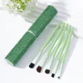 Green rhinestone 5-piece makeup brush set with a matching sparkly cylinder case - Green