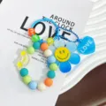 Bunter Perlen-Schlüsselanhänger mit blauer Sonnenblume und süßem Smiley-Gesicht-Charm - Blau