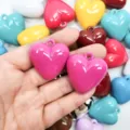Variety of colorful glossy acrylic heart charms with holes for DIY jewelry and keychain making - Rose Red