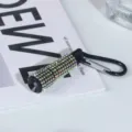 Handheld portable mini flashlight covered in colorful rhinestones with black carabiner - Iridescent Rhinestones