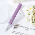Close-up detail of a purple rhinestone nail art pen with 5 interchangeable metal painting nibs - Light Purple