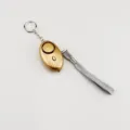 Personal security alarm in gold finish with key ring and grey wrist strap for safety - Gold
