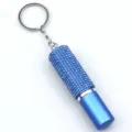 Close-up of blue rhinestone-studded 5ml portable perfume spray bottle keychain accessories - Blue Bottle with Blue Rhinestones