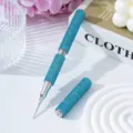 Close-up of a blue rhinestone-encrusted double-ended nail art liner pen and cap - Sky Blue