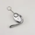 Silver portable personal security alarm with LED light and sturdy keychain for women - Silver