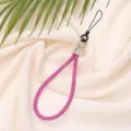 Close-up of 6mm pink luxury rhinestone phone wrist strap with silver metal clip - Rose Red