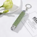 Close-up of mini LED flashlight keychain encrusted with sparkling green rhinestones. - Without Battery / Fluorescent Green
