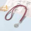 Close-up of 6-row purple rhinestone lanyard with durable metal lobster clasp - Fuschia