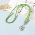 Close-up of green rhinestone phone lanyard with silver metal lobster clasp - Green
