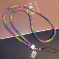 Close-up detail of a luxurious sparkling rainbow rhinestone mobile phone lanyard strap - Rainbow (Neck Style)