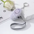 Detail of sparkling lavender rhinestone-studded personal safety alarm keychain with strap - AB White