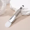 Detailed view of dual-ended silicone mask brush with elegant rhinestone handle. - Silicone Brush / White
