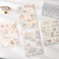 Detailed view of cute translucent loose-leaf B5 notebooks featuring lovely cat illustrations. - Dotted Cute Animal Mixed 4 Styles / A4