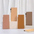 Minimalist slim B5 ruled notebooks in assorted warm colors with gold foil avocado icon - 4 Colors Mixed