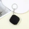 Detailansicht Mini-Maßband-Schlüsselanhänger mit schwarzen Strasssteinen, 1m lang - Schwarz