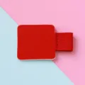 Red PU leather self-adhesive pen holder with elastic band for notebooks and tablets. - Red