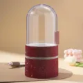 Detail of red rhinestone makeup brush holder with clear dustproof capsule lid. - Red