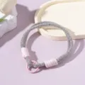 Detailansicht der funkelnden Strass-Handschlaufe für Telefone mit rosa Kordel - Rhinestone Phone Wristlet / Rosa