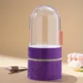 Detail view of purple rhinestone makeup brush holder with a clear protective dome lid - Purple
