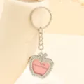 Creative heart-shaped keychain with rhinestones and pink mini photo frame insert - Apple