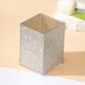 Close-up view showing the sparkling rhinestone detail of the makeup brush holder - AB White