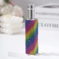 Detailed macro shot of 10ml glass perfume spray bottle with rainbow rhinestone sleeve - 10ml / Colorful