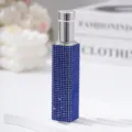 Detailed view of a 10ml portable perfume atomizer with blue rhinestone decoration - 10ml / Sapphire Blue