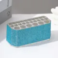 Detailed view of luxury 26-hole acrylic makeup brush holder with blue rhinestones - Lake Blue