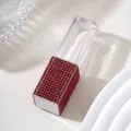 Elegant square lip gloss tube with sparkly red rhinestone bottom and clear top cap - Red