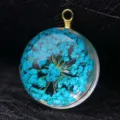Exquisite macro detail of natural blue dried flower preserved in clear resin glass pendant - Gold Wire (P2017) / 15mm Diameter / Blue